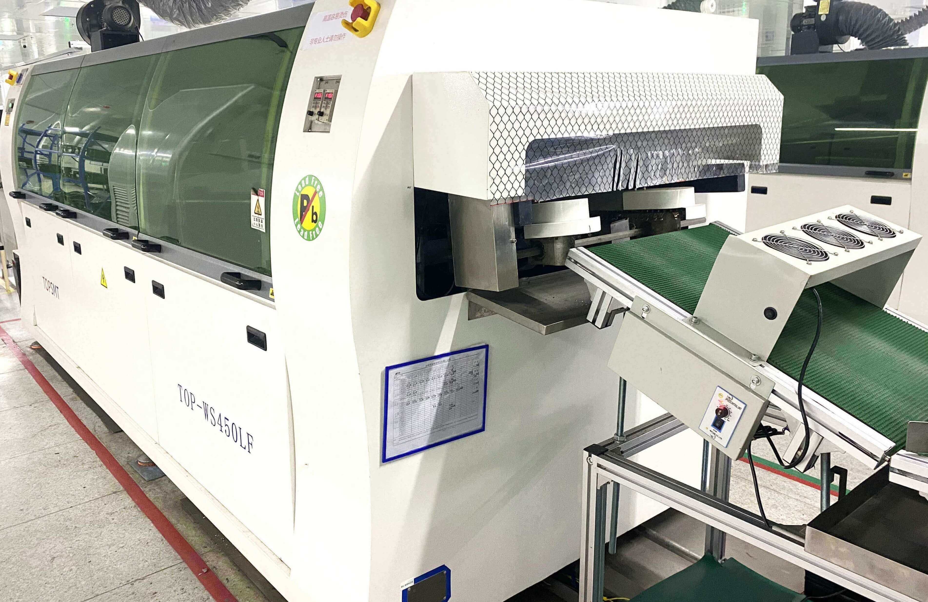 smt贴片波峰焊_波峰焊连锡的主要原因及解决措施(图1) 波峰焊机 (2).jpg