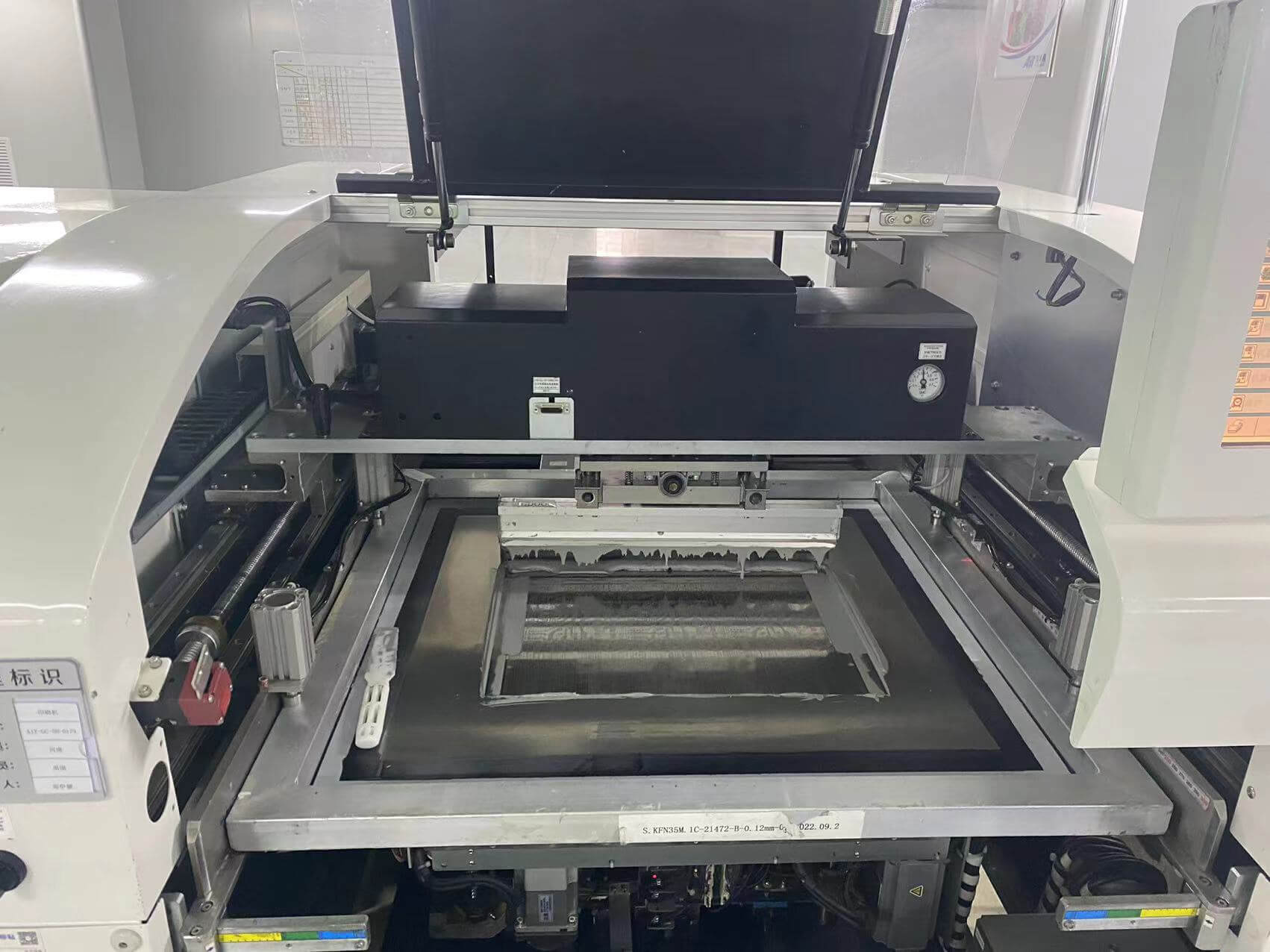 smt贴片加工_钢网的制作工艺是什么(图2) 印刷机.jpg